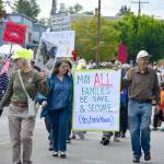 Members of Jefferson County Immigrants Rights Advocates march through uptown Port Townsend in last months Rhody Grand Parade. (Diane Urbani de la Paz/for Peninsula Daily News)