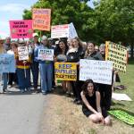 Members of the Jefferson County Immigrant Rights Advocates demonstrate Tuesday to bring attention to the separation of children and their families seeking asylum at the border of the United States and Mexico. (Jeannie McMacken/Peninsula Daily News)