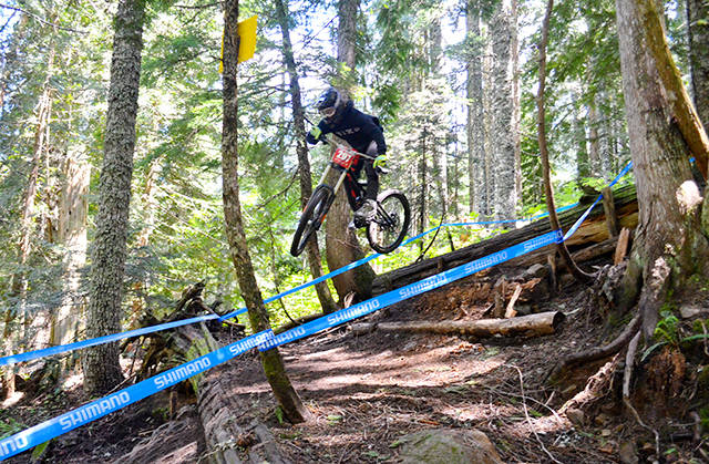 Port Angeles Matt Mangano rides downhill to a victory at the Northwest Cup downhill mountain biking series third race of the season at Mount Hood Skibowl last weekend.