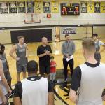 Mitch Freeman, center, has left the Peninsula College mens basketball program after five seasons as head coach to take the head coaching position at Corban University in Salem, Ore. Pirates assistant, Donald Rollman, to Freemans right, will serve as interim head coach in 2018-19.                                Peninsula College Athletics
