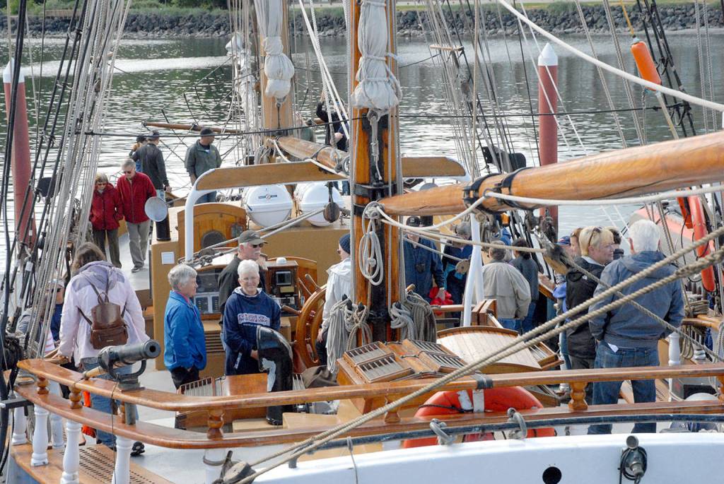 Maritime Festival visiters take a tour of the tall ship Hawaiian Chieftain on Saturday. (Keith Thorpe/Peninsula Daily News)