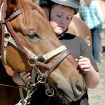Thomas Grace, 12, of Port Townsend pauses for a moment with Nevada, the horse he rides in the Salish Spirit equine therapy program. (Candace Raab)