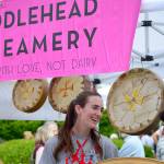 Fiddlehead Creamerys Becky Christoforo scoops coconut cream gelato at the Port Townsend Farmers Market. Ayisha Jeffer, at right, provides support. (Diane Urbani de la Paz/for Peninsula Daily News)