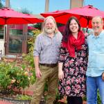 Cooking up the Townsend Bay Music Festival are, from left, Gerry Sherman, Aislinn Palmer and Ralph Baker. Theyre on the patio of Port Hadlocks Old Alcohol Plant, where the festival takes place this Saturday. (Diane Urbani de la Paz/for Peninsula Daily News)