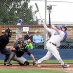 Port Angeles Kyle Schimpf, right, leads the West Coast League in home runs with five and hit-by-pitches with six.                                Dave Logan/for Peninsula Daily News