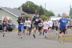 SPORTS BRIEFS: Coed softball registration in Port Angeles; Sequim, Port Angeles players voted to All-State soccer team; Fun run held in Forks