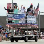 The Forks Outfitters store entered its large grocery cart honoring the United States in the grand parade. (Lonnie Archibald/ for Peninsula Daily News)