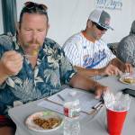 Port Angeles artist and pie judge Jeff Tocher, left, along with fellow judges Darren Westergard, coach of the Port Angeles Lefties, and John Brewer, community volunteer and former Peninsula Daily News publisher, taste samples of apple pie during Wednesdays Independence Day Pies on the Pier contest. (Keith Thorpe/Peninsula Daily News)                                Port Angeles artist and pie judge Jeff Tocher, left, along with fellow judges Darren Westergard, coach of the Port Angeles Lefties, and John Brewer, community volunteer and former Peninsula Daily News publisher, taste samples of apple pie during Wednesdays Independence Day Pies on the Pier contest. (Keith Thorpe/Peninsula Daily News)