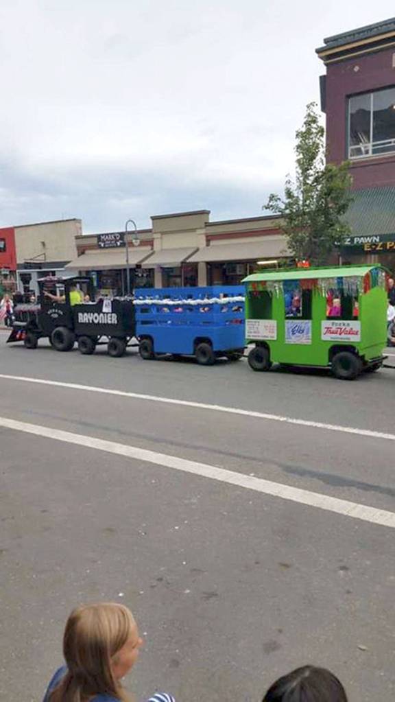 A miniature train makes its way down First Street in Port Angeles parade. (Joy Wetterlund)
