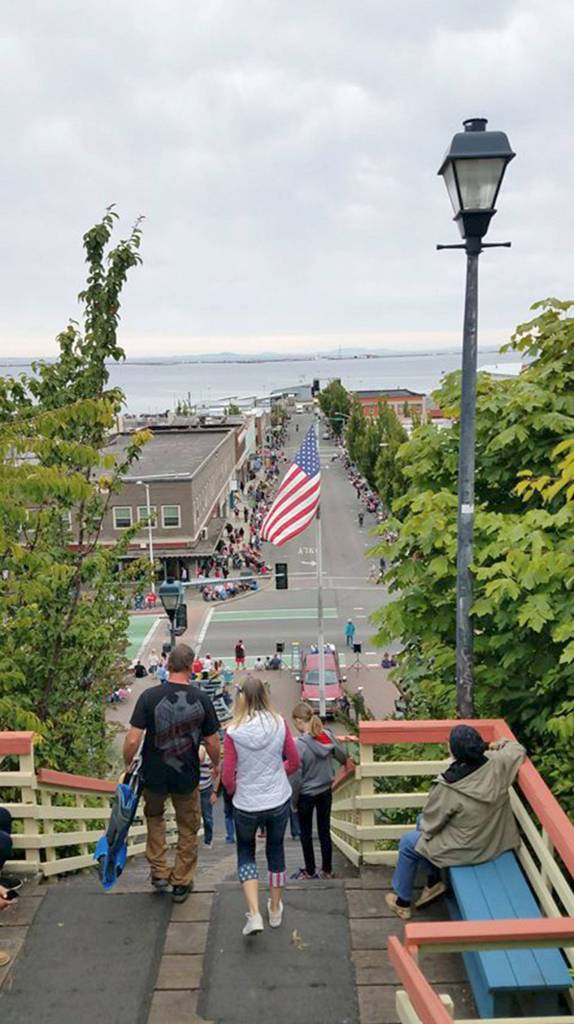 The Laurel Street steps were busy Wednesday night as Port Angeles residents and visitors walk down to the towns Independence Day parade. (Joy Wetterlund)