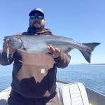 For over three years, Woodinvilles John Watkins has tried to catch a legal-sized hatchery chinook. He succeeded Tuesday, catching this mid-teens king while jigging with an all-glow 1-ounce Kandlefish jig at Freshwater Bay.