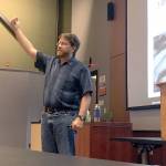 Marc Fries, NASA cosmic space dust curator, speaks at Peninsula College on Thursday. Fries and the crew of the exploration vessel Nautilus believe they discovered Monday small fragments of a meteorite that exploded over the Olympic Coast National Marine Sanctuary on March 7. (Rob Ollikainen/Peninsula Daily News)