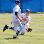 Keith Thorpe/Peninsula Daily News Wilder center fielder Tyler Bowen, right, reaches for a fly ball as left fielder Carson Jackson looks on during the first game of a double header against Lakeside Recovery on Wednesday at Port Angeles Civic Field.