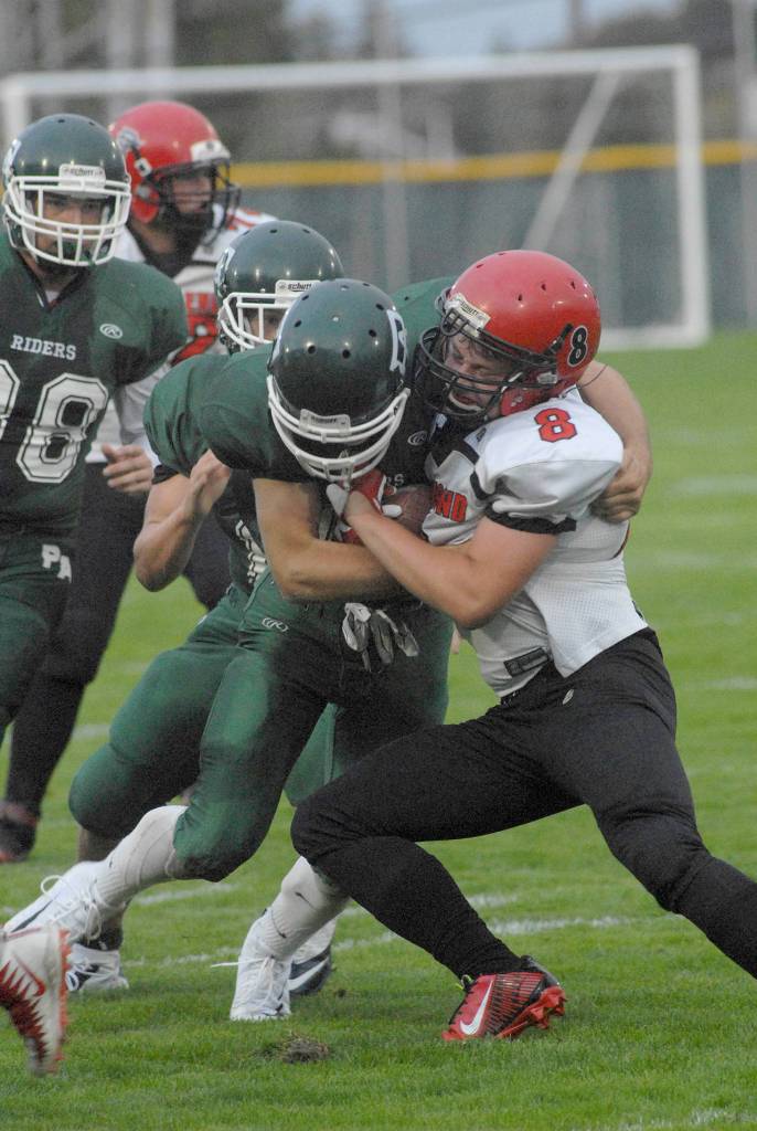 Keith Thorpe/Peninsula Daily News Port Townsends Nico Winegar, right, should get carries as part of the Redhawks new flexbone offense.