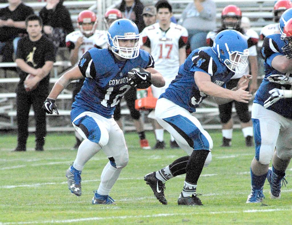 <strong>Keith Thorpe</strong>/Peninsula Daily News                                Chimacum running back Logan Storm (12) is one of a number of players returning from last years squad, which improved from 0-10 to 4-6 in 2017.