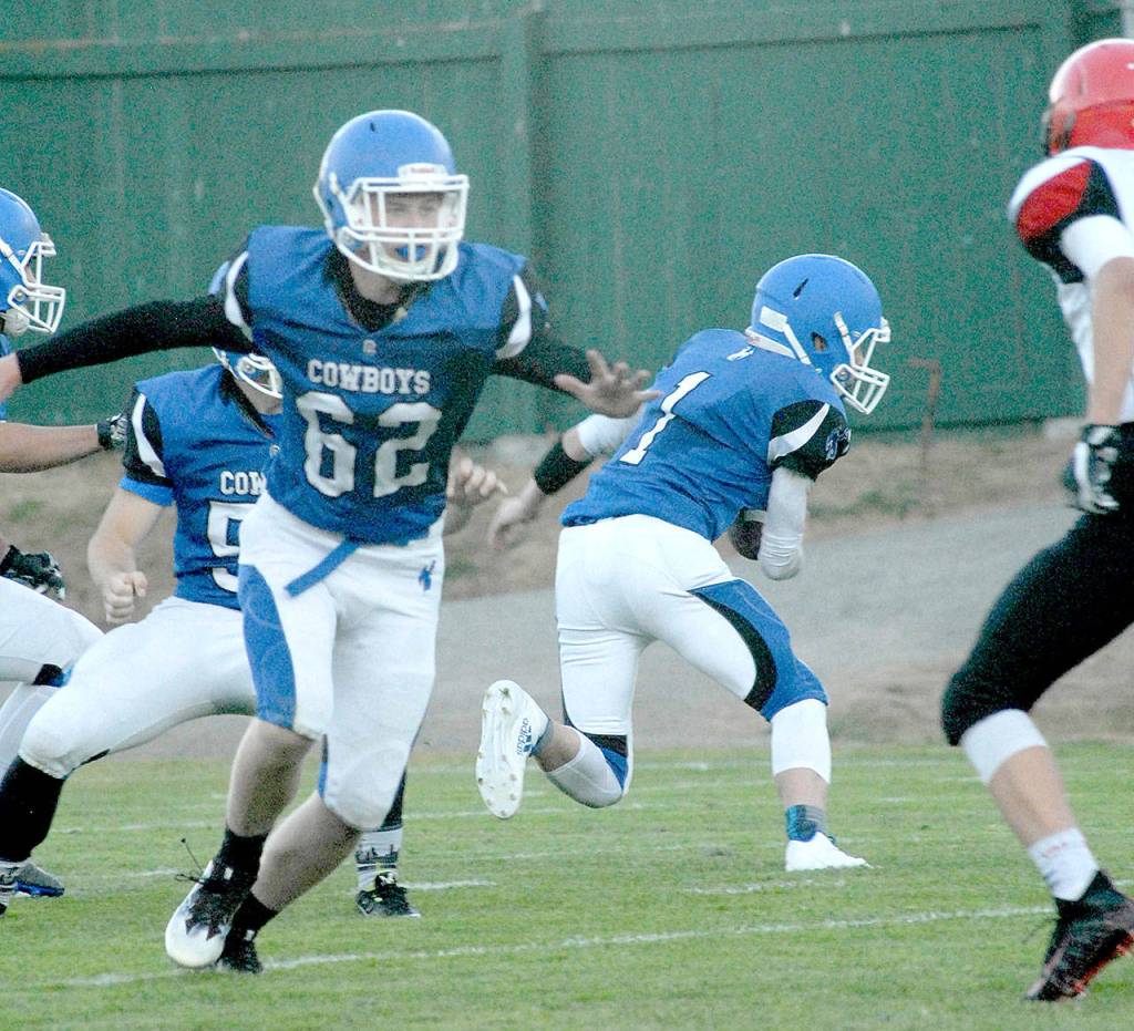 Keith Thorpe/Peninsula Daily News Also returning this year for the Cowboys is Ben Preston (62), a standout on defense.