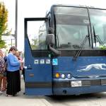 Passengers board the Dungeness Line to Seattle and SeaTac International Airport at The Gateway transit center in Port Angeles. (Keith Thorpe/Peninsula Daily News)