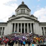 In this May 17 file photo hundreds of charter school students, teachers and supporters rally at the Capitol in Olympia. (The Associated Press)