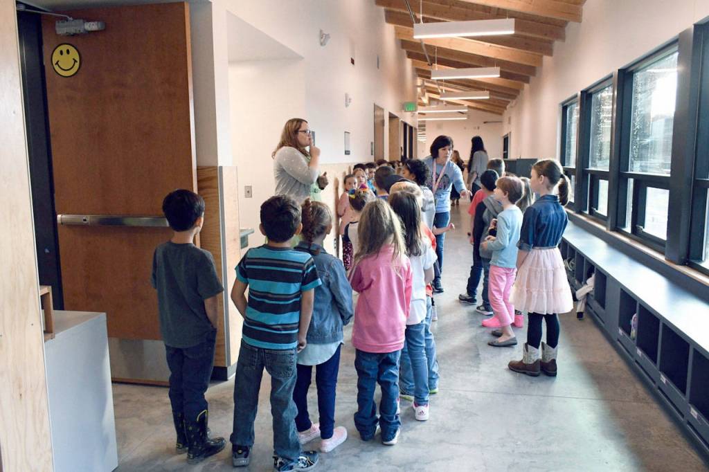 Salish Coast Elementary students line up outside their new classroom during the first day of school Tuesday. (Jeannie McMacken/Peninsula Daily News)