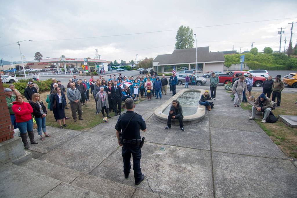 Port Angeles Police Chief Brian Smith speaks to a crowd of about 75 during the World Suicide Prevention Day in Port Angeles on Monday. (Jesse Major/Peninsula Daily News)