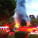 Fire crews with Clallam County Fire District 3 respond to Cedars at Dungeness early Sunday morning where an approximate 24-foot-by-100-foot building was on fire. An estimated 50 golf carts were destroyed. (Clallam County Fire District No. 3)