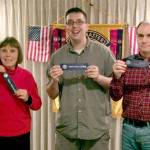 Skwim Toastmasters Club members Linda Christensen, Jeff Tingelstad and Craig Barron display their recent honors.