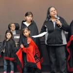 Lower Elwha Klallam Tribe Chairwoman Frances Charles, second from right, speaks about her tribes long-standing relationship with the city of Port Angeles after hearing a proclamation read Tuesday by Port Angeles Mayor Sissi Bruch, left, calling for Oct. 8 to be Indigeneous Peoples Day. Among the children taking part in the ceremony were, from left, Khyla Miller, 4, Zoey Henderson, 7, Malena Marquez, 11 and Shawnee Tom, 11. Seated at rear is Deputy Mayor Kate Dexter. (Keith Thorpe/Peninsula Daily News)