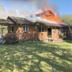 The cedar home of Clallam Bay High School basketball Coach Kelly Gregory was destroyed by fire late Thursday night. (Clallam County Fire District 5)