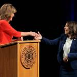 Sen. Maria Cantwell, D-Wash., right, shakes hands with her Republican challenger, Susan Hutchison, on Monday following a debate at Pacific Lutheran University in Tacoma. (Ted S. Warren/The Associated Press)