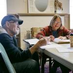 Contributing author Jim Guthrie and Carol Willis, Olympic Theatre Arts executive director, finalize the script for The Nutcracker Cracked Up. (Olympic Theatre Arts)