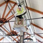 Lead electrician Vladimir Romanov of Lumenal Lighting replaces outdated lighting fixtures with energy efficient LED lightbulbs in October in the Nora Porter Commons Building at Fort Worden. (Megan Claflin)