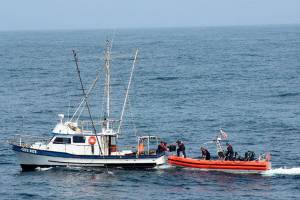 <strong>Ens. Skye-Marie Jensen</strong>/U.S. Coast Guard                                Coast Guard Cutter Active crew members conduct a law enforcement boarding of a fishing vessel near Heceta Bank off the coast of Oregon on their transit south, Aug. 26.
