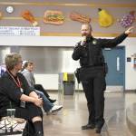 Port Townsend police officer and school resource officer Jeremy Vergin presented the first ALICE training module for all teachers, staff and administrators Wednesday at Blue Heron Middle School. The active shooter training is being provided to the entire district. (Jeannie McMacken/ Peninsula Daily News)