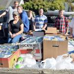 Port Angeles High School students deliver a record amount of food and hygiene items to the Port Angeles Food Bank after their annual school food drive. From left are Sammi Bates, AJ Fischer, Dalton Daugaard, Rylee Lawrence, teacher and freshman class advisor Christian Gentry, Alex Hertzog and Justice Davis. Not shown are PAHS teachers Bernie Brabant, John Gallagher, Dan Helpenstell and Pam Helpenstell, who also helped deliver items to the food bank. (Patsene Dashiell/Port Angeles School District)