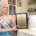 Port Angeles City Council Member Cherie Kidd displays a plaque she received as first runner-up in the 2018 Ms. Senior USA pageant. She will participate in the Ms. Senior Universe pageant this week in Las Vegas. (Keith Thorpe/Peninsula Daily News)