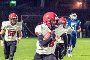PREP FOOTBALL: Port Townsend and Chimacum combine for 130 points, 1,165 offensive yards in 79-51 rivalry shootout