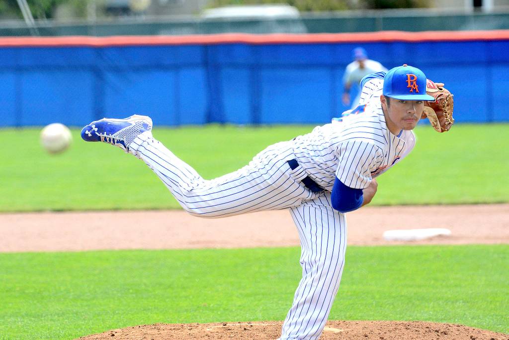 <strong>Jesse Major</strong>/Peninsula Daily News                                Port Angeles Lefties pitcher Tyler Tan pitches against the Yakima Valley Pippins during a game in July at Civic Field. Tan is returning to Port Angeles next year.