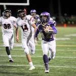 Michael Dashiell/Olympic Peninsula News Group Sequims Kyler Rollness makes a long gain during the Wolves win over Franklin Pierce last week.
