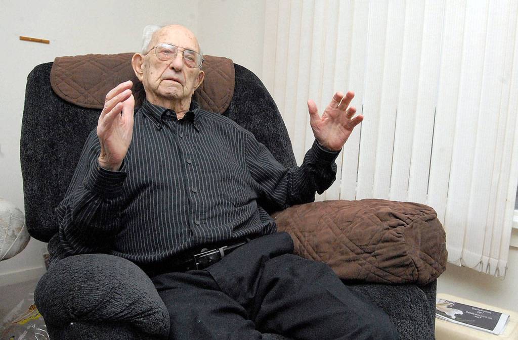 U.S. Marine Corps veteran Tom McKeown Sr., reminisces about his World War II experiences. (Keith Thorpe/Peninsula Daily News)