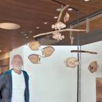 David Johannessohn shows his fish mobile.