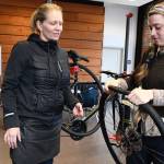 Instructor Tori Bortman, left, of Gracies Wrench in Portland, Ore., helps Port Townsend student Tedi Beck during a bike mechanics class through the Port Townsend Cycle School. Beck said she would love to become a bike mechanic. Beck learned that bikes are very custom and the more you can understand how to build a bike, the more you can build it to your own preferences. I find that really cool. (Jeannie McMacken/Peninsula Daily News)
