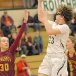 Keith Thorpe/Peninsula Daily News Port Angeles Madison Cooke puts up a running one-hand shot against Kingston last season.