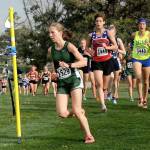 Lauren Larson leads the pack at the state 2A girls cross-country meet in Pasco in October. Larson ended up finishing fourth. (Lonnie Archibald/for Peninsula Daily News)