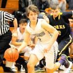 BOYS PREP BASKETBALL: Wolves slip past Spartans