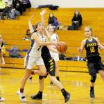 Michael Dashiell/Olympic Peninsula News Group Sequims Jessica Dietzman drives and prepares to shoot inside against Forks during the Wolves 81-25 win Monday.