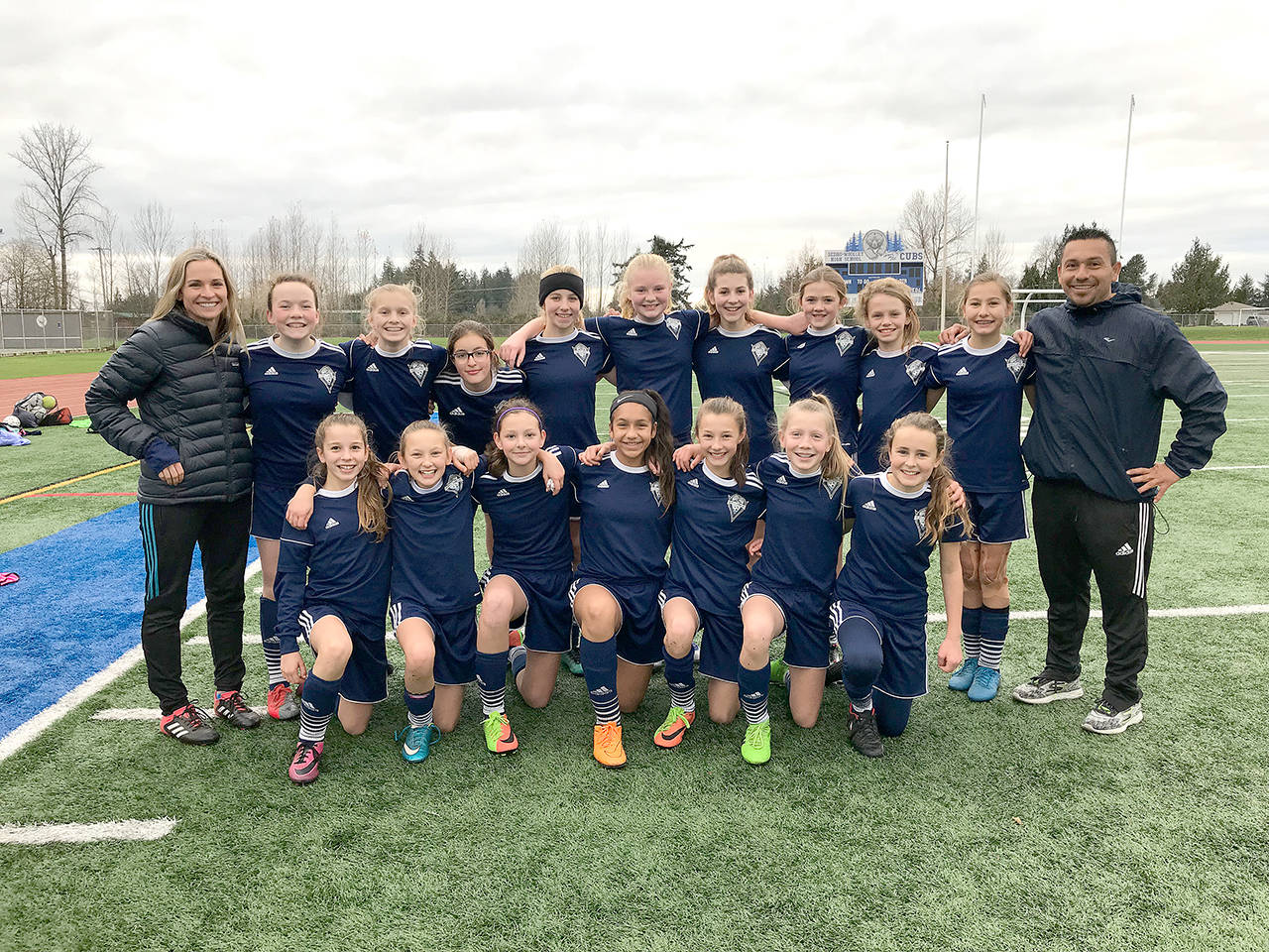 Storm King GU13 The Storm King Girls U-13 soccer team finished 11-1 this fall and earned the North Puget Sound Leagues GU13 Division 2 Green Championship. The team, with players from Port Angeles, Sequim and Chimacum, scored 50 goals and allowed just seven. Back row pictured from left, assistant coach Robin Henrikson, Becca van Dyken, Jolene Vaara, Julia Raupp, Ava-Anne Sheahan, Paige Mason, Kaia Lestage, Eve Breithaupt, Ivy Barrett, Taryn Johnson, head coach Javier Gomez and front, Kinzley Henrikson, Gianna Riccobene, Waverly Mead, Jennyfer Gomez, Mikiah Winter, Isabelle Felton and Nikoline Updike.