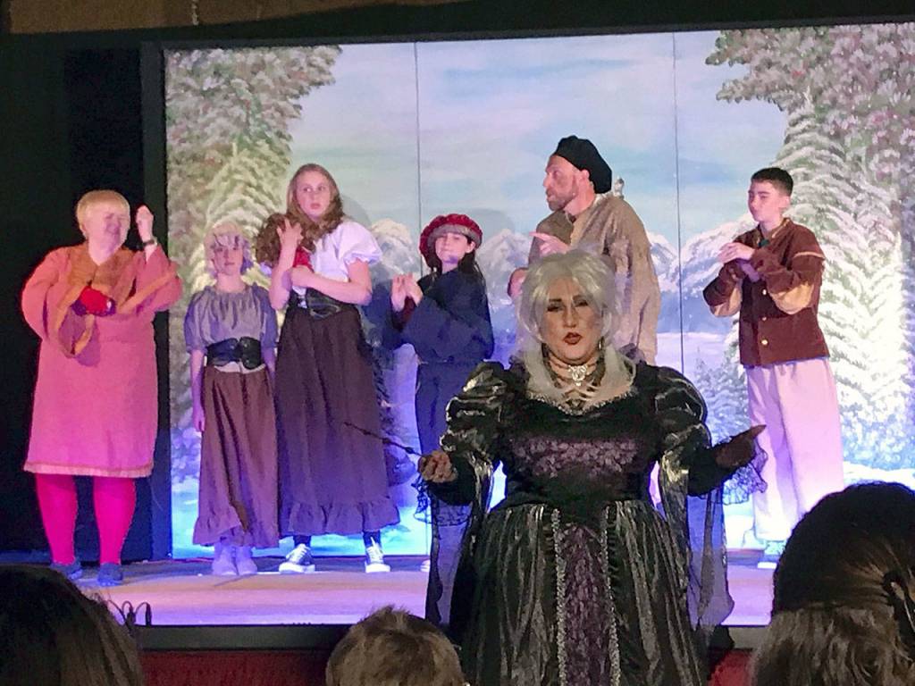 Jennifer Horton plays the evil stepmother in the Snow White and the Five Housemates. (Paul Gottlieb/Peninsula Daily News)