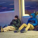 Port Angeles City Manager Nathan West and council member Mike French sit outside the Salvation Army on Friday morning. (Jesse Major/Peninsula Daily News)
