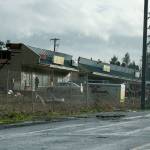 A tornado swept across Bethel Avenue in Port Orchard on Tuesday afternoon. It damaged commercial buildings in its path and took the roof off a nearby home. (Bob Smith/Kitsap News Group)
