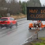 A traffic board at U.S. Highway 101 at Laird Road west of Port Angeles warns motorists of a highway closure ahead at Lake Crescent on Thursday. (Keith Thorpe/Peninsula Daily News)